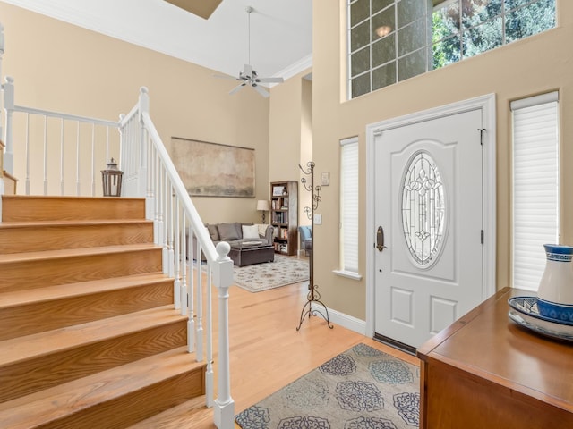 811 E Country View Cir, Fresno, CA 93730 - entrance foyer featuring a towering ceiling, stairs, wood finished floors, and ceiling fan