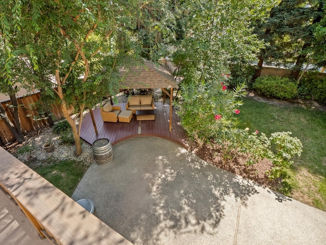 811 E Country View Cir, Fresno, CA 93730 - fenced backyard with a gazebo, a wooden deck, and a patio area