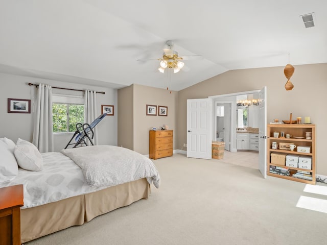 811 E Country View Cir, Fresno, CA 93730 - bedroom featuring light carpet, a chandelier, vaulted ceiling, a ceiling fan, and ensuite bathroom