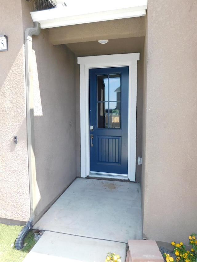 5875 E Pitt Ave, Fresno, CA 93727 - doorway to property with stucco siding