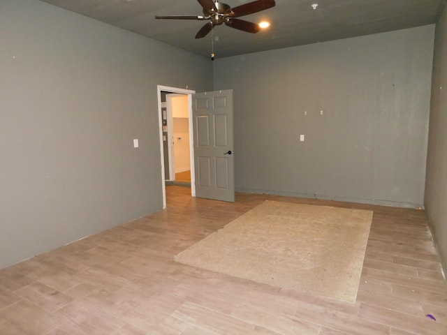 5875 E Pitt Ave, Fresno, CA 93727 - spare room with a ceiling fan and light wood finished floors