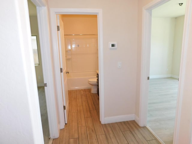 5875 E Pitt Ave, Fresno, CA 93727 - hall featuring light wood-type flooring and baseboards