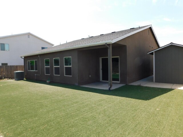 5875 E Pitt Ave, Fresno, CA 93727 - back of house featuring a patio area, stucco siding, central AC, and roof with shingles