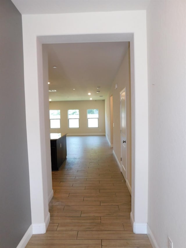 5875 E Pitt Ave, Fresno, CA 93727 - hall featuring light wood-type flooring, recessed lighting, and baseboards