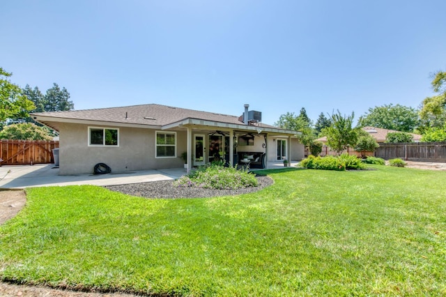 1758 Ash Ave, Clovis, CA 93611 - back of property featuring a patio area, stucco siding, ceiling fan, and a fenced backyard