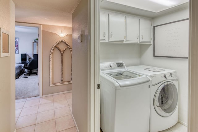 1758 Ash Ave, Clovis, CA 93611 - laundry room with washer and clothes dryer, cabinet space, an office area, light tile patterned floors, and light carpet