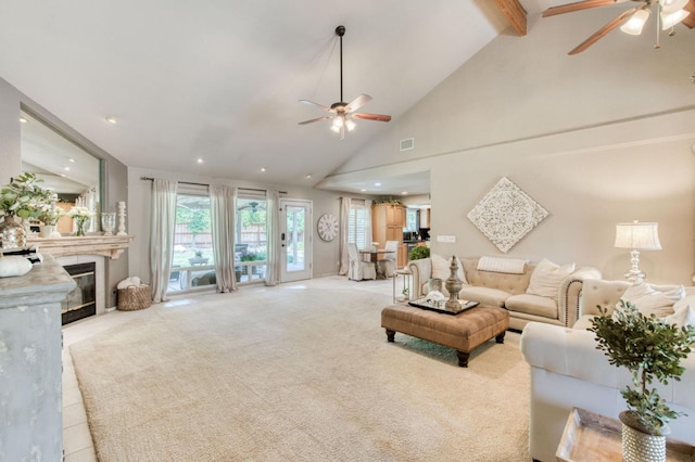 1758 Ash Ave, Clovis, CA 93611 - carpeted living area with ceiling fan, a glass covered fireplace, recessed lighting, beam ceiling, and high vaulted ceiling