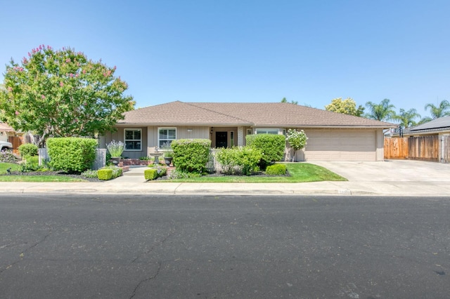 1758 Ash Ave, Clovis, CA 93611 - ranch-style house with a garage and concrete driveway