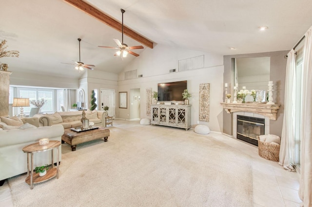 1758 Ash Ave, Clovis, CA 93611 - living room featuring a glass covered fireplace, beam ceiling, a ceiling fan, plenty of natural light, and high vaulted ceiling