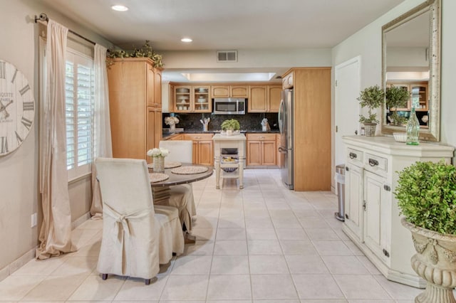 1758 Ash Ave, Clovis, CA 93611 - dining room with recessed lighting and light tile patterned flooring