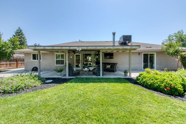 1758 Ash Ave, Clovis, CA 93611 - back of property featuring stucco siding, a patio area, central AC unit, and ceiling fan