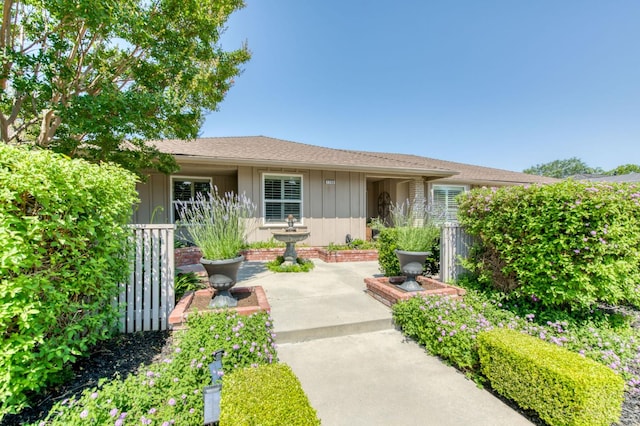 1758 Ash Ave, Clovis, CA 93611 - view of front of house featuring board and batten siding