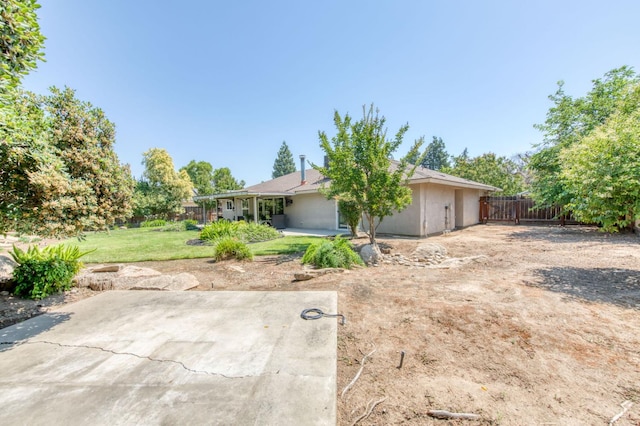 1758 Ash Ave, Clovis, CA 93611 - view of yard featuring a patio