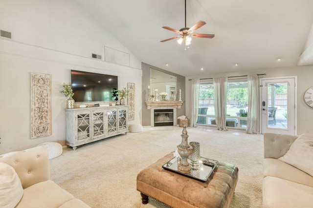 1758 Ash Ave, Clovis, CA 93611 - carpeted living area with ceiling fan, high vaulted ceiling, a glass covered fireplace, and recessed lighting