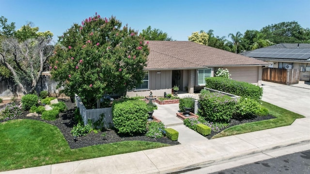 1758 Ash Ave, Clovis, CA 93611 - single story home with an attached garage, concrete driveway, and board and batten siding