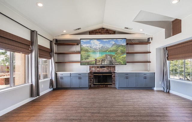 697 E Omaha Ave, Fresno, CA 93720 - unfurnished living room featuring lofted ceiling, wood finished floors, baseboards, a fireplace, and recessed lighting