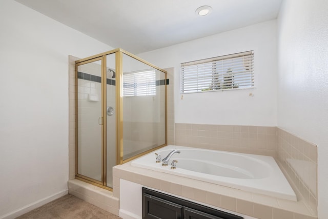 697 E Omaha Ave, Fresno, CA 93720 - bathroom with a stall shower and a garden tub