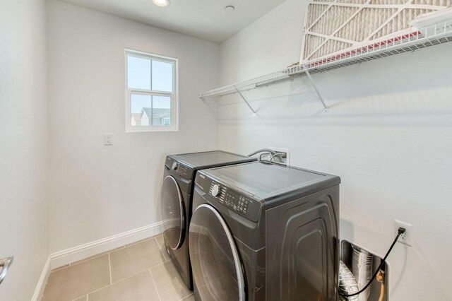 3923 Morris Ave, Clovis, CA 93619 - washroom featuring independent washer and dryer, baseboards, light tile patterned floors, and recessed lighting