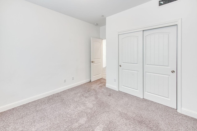 3923 Morris Ave, Clovis, CA 93619 - unfurnished bedroom with carpet flooring, a closet, and baseboards