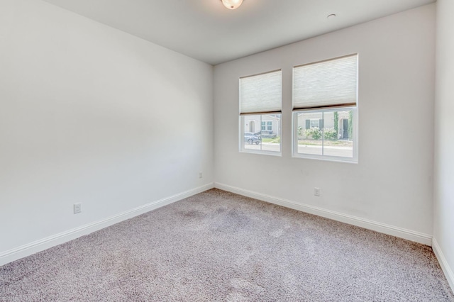 3923 Morris Ave, Clovis, CA 93619 - spare room featuring light colored carpet and baseboards