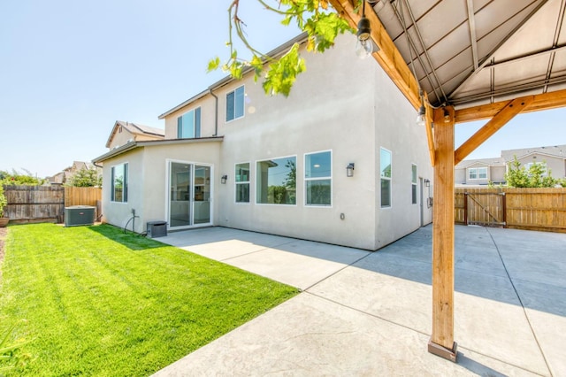 3923 Morris Ave, Clovis, CA 93619 - back of property with stucco siding, cooling unit, and a patio area
