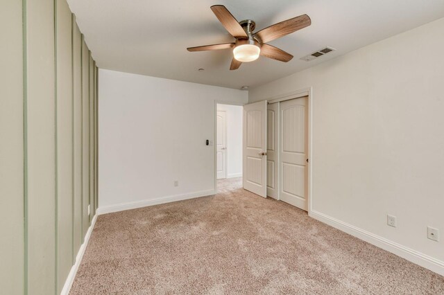 3923 Morris Ave, Clovis, CA 93619 - unfurnished bedroom featuring carpet floors, baseboards, a closet, and a ceiling fan