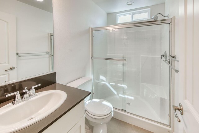 3923 Morris Ave, Clovis, CA 93619 - bathroom with a shower stall, vanity, and toilet
