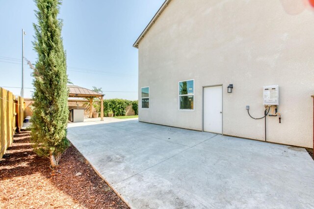 3923 Morris Ave, Clovis, CA 93619 - view of patio with a gazebo and water heater