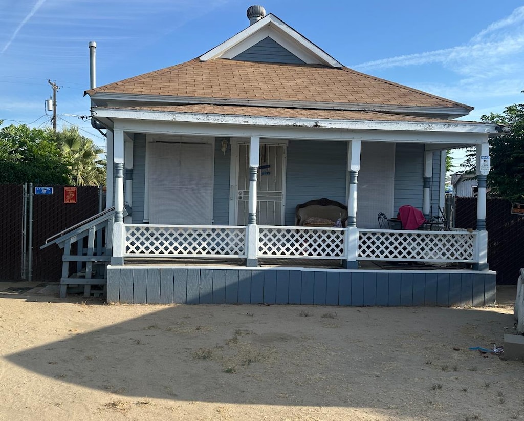 2419 Knowles, Selma, CA 93662 - view of front facade featuring a porch and roof with shingles