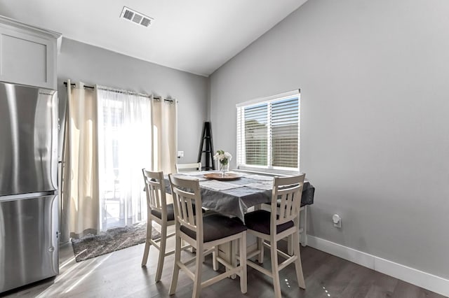 22375 Fairmead Cir, Chowchilla, CA 93610 - dining room featuring lofted ceiling and wood finished floors
