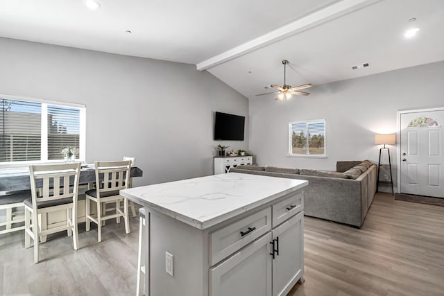 22375 Fairmead Cir, Chowchilla, CA 93610 - kitchen with light wood finished floors, open floor plan, ceiling fan, a center island, and recessed lighting