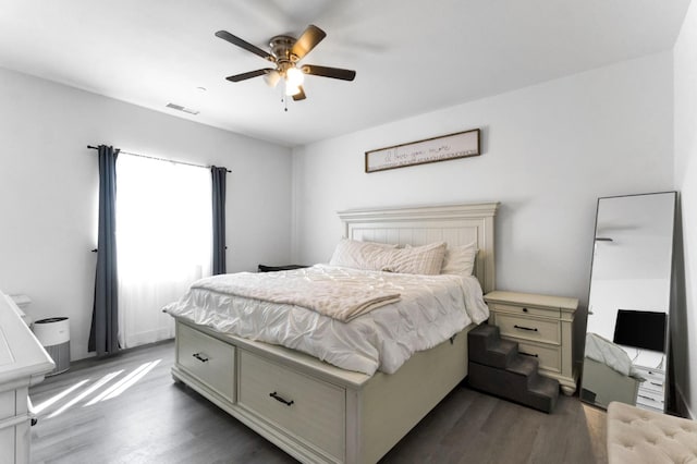 22375 Fairmead Cir, Chowchilla, CA 93610 - bedroom featuring dark wood finished floors and ceiling fan