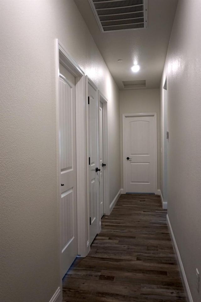 29030 Yosemite Springs Pkwy, Coarsegold, CA 93614 - corridor featuring dark wood-style floors and baseboards