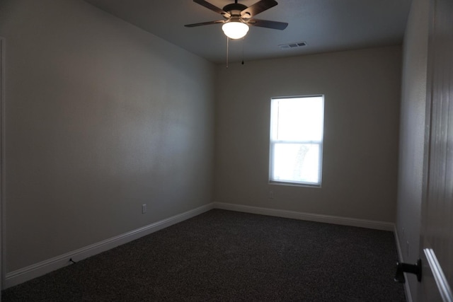 29030 Yosemite Springs Pkwy, Coarsegold, CA 93614 - unfurnished room with dark colored carpet, a ceiling fan, and baseboards