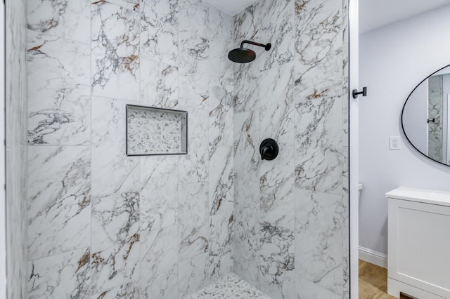 1904 S Fairway Ave, Fresno, CA 93727 - full bath with a marble finish shower, vanity, and baseboards