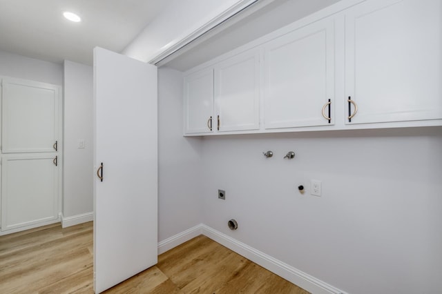 1904 S Fairway Ave, Fresno, CA 93727 - laundry area featuring hookup for an electric dryer, cabinet space, light wood finished floors, baseboards, and washer hookup