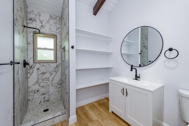 1904 S Fairway Ave, Fresno, CA 93727 - full bathroom with wood finished floors, a marble finish shower, vanity, beamed ceiling, and toilet