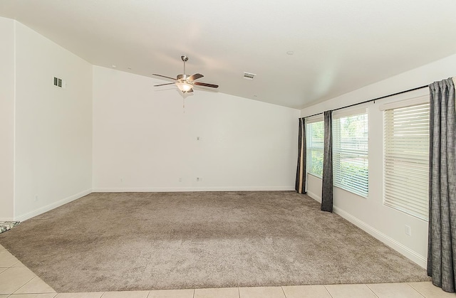 461 S Cascade Way, Madera, CA 93636 - empty room featuring vaulted ceiling, light carpet, a ceiling fan, and light tile patterned flooring