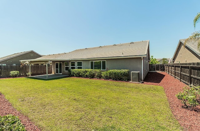 461 S Cascade Way, Madera, CA 93636 - back of property featuring a patio area, stucco siding, and a fenced backyard