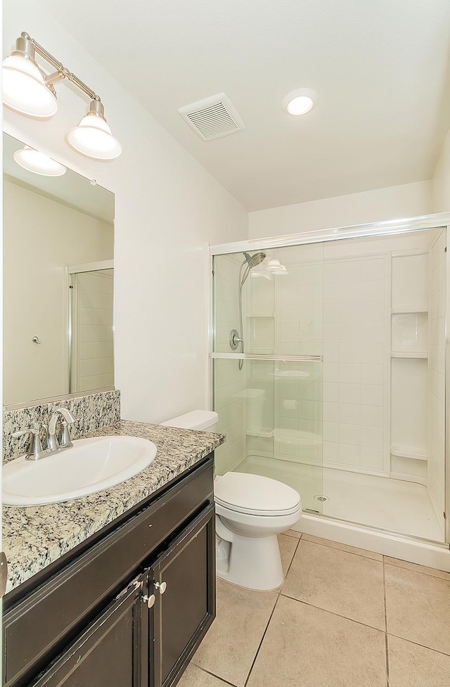 461 S Cascade Way, Madera, CA 93636 - full bath with tile patterned floors, vanity, and a shower stall