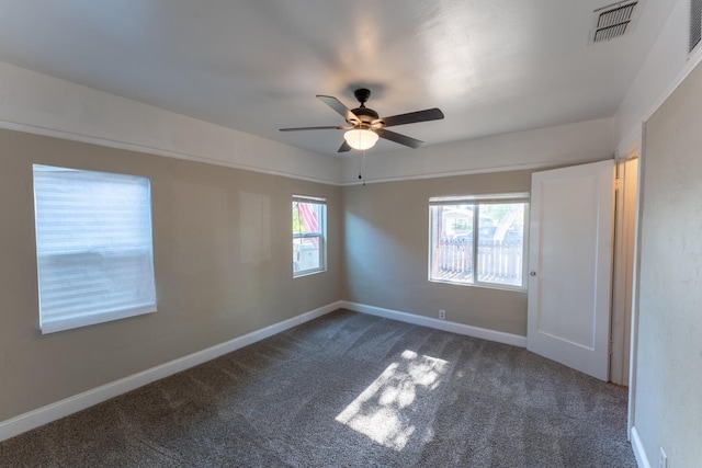 963 N Arthur Ave, Fresno, CA 93728 - unfurnished room with dark carpet and a ceiling fan