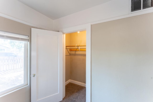 963 N Arthur Ave, Fresno, CA 93728 - unfurnished bedroom featuring a walk in closet, a closet, and carpet floors