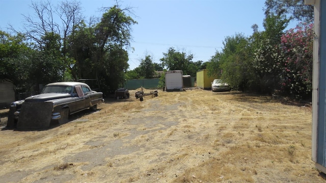 1625 N Woodson Ave, Fresno, CA 93705 - view of yard featuring a storage shed