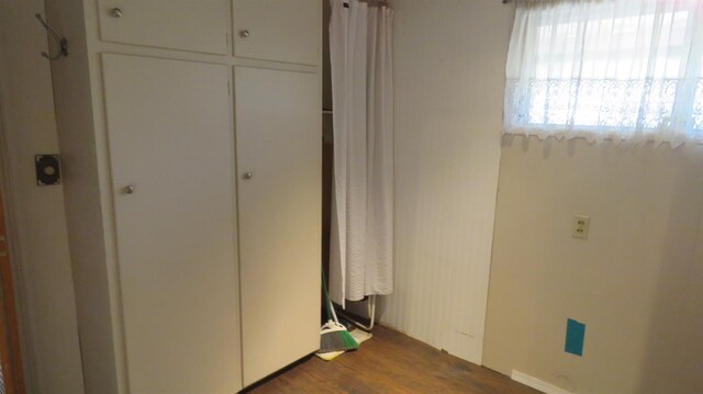 1625 N Woodson Ave, Fresno, CA 93705 - unfurnished bedroom featuring dark wood-style floors and a closet