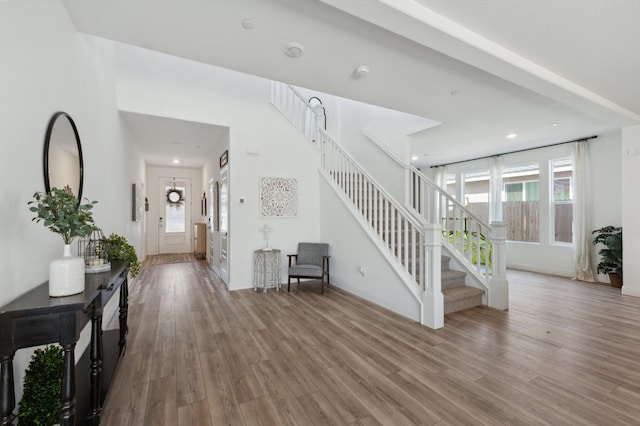 6406 E Giavanna Ave, Fresno, CA 93727 - foyer with wood finished floors, stairway, and recessed lighting