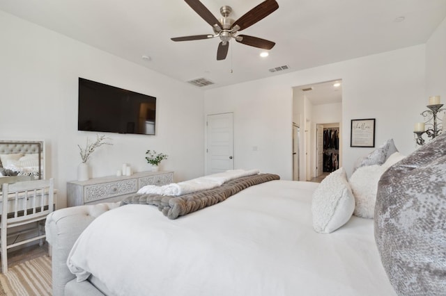 6406 E Giavanna Ave, Fresno, CA 93727 - bedroom featuring a walk in closet, a ceiling fan, a closet, and recessed lighting