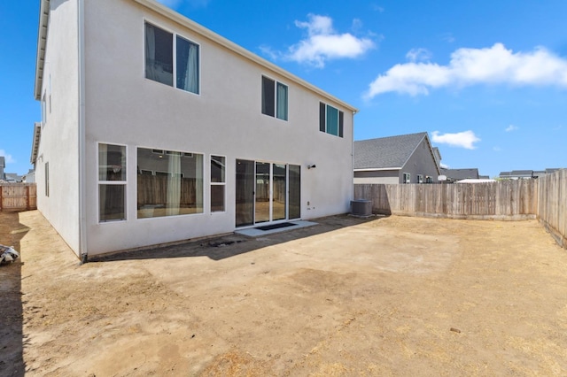 6406 E Giavanna Ave, Fresno, CA 93727 - rear view of house featuring a fenced backyard, stucco siding, and a patio