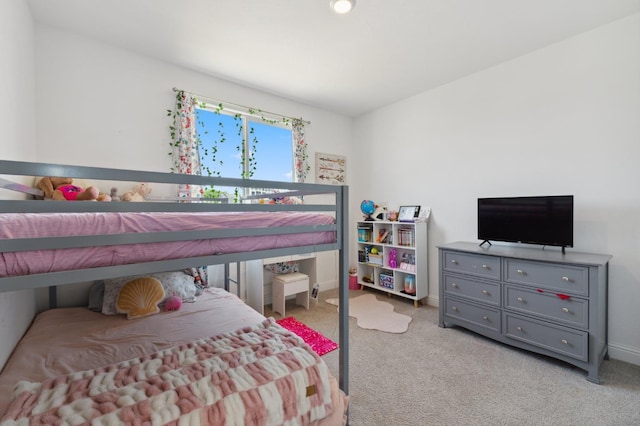 6406 E Giavanna Ave, Fresno, CA 93727 - bedroom featuring light colored carpet and baseboards
