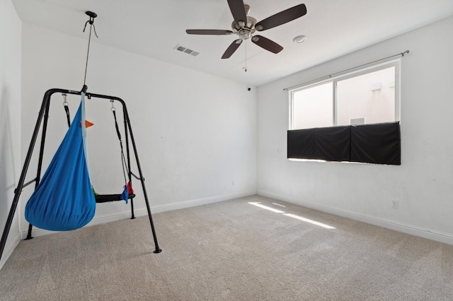 6406 E Giavanna Ave, Fresno, CA 93727 - empty room featuring carpet floors and a ceiling fan