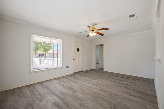 3919 E Butler, Fresno, CA 93702 - unfurnished living room with wood finished floors and a ceiling fan